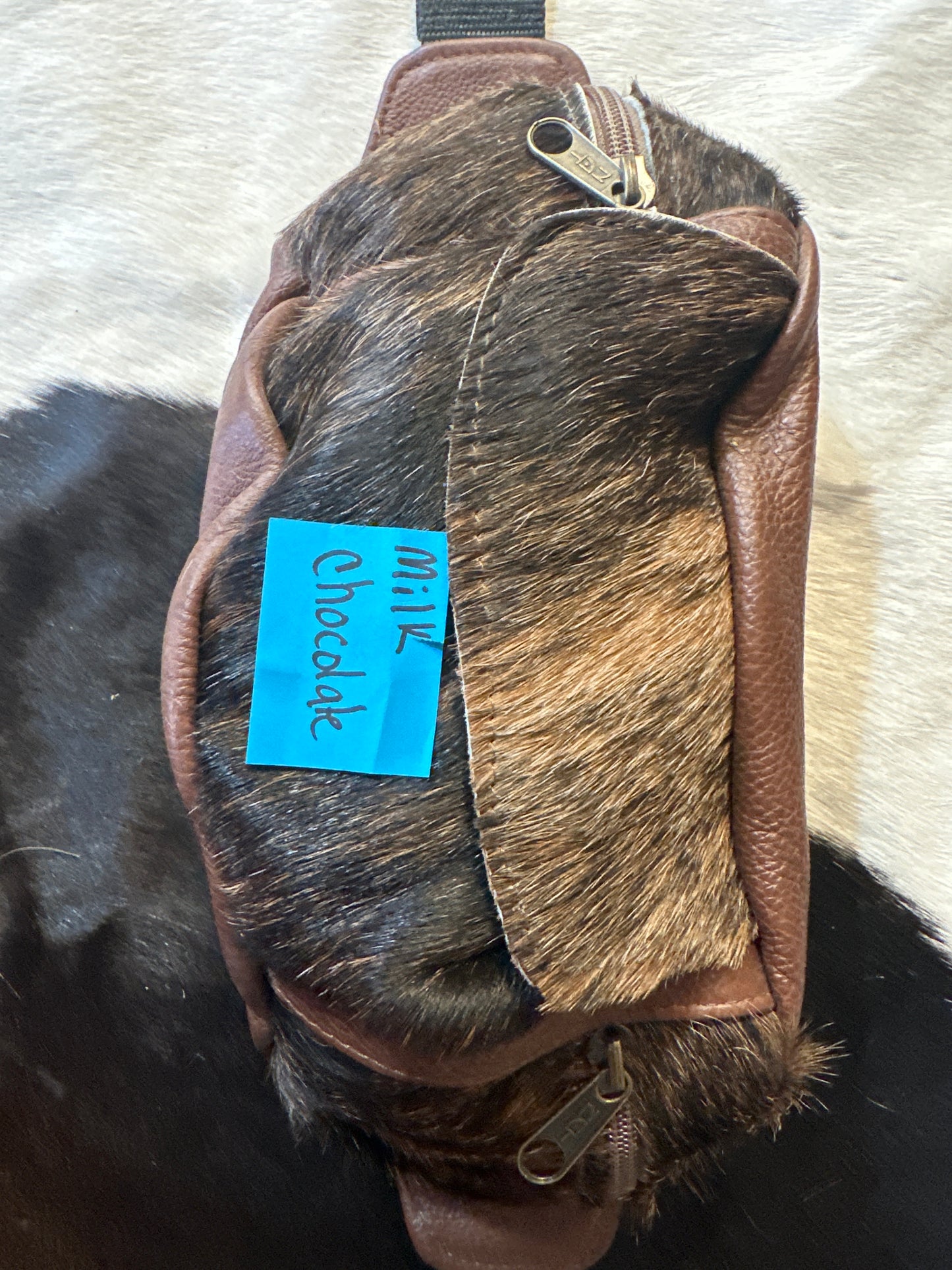 Leather hair on hide cantel bag